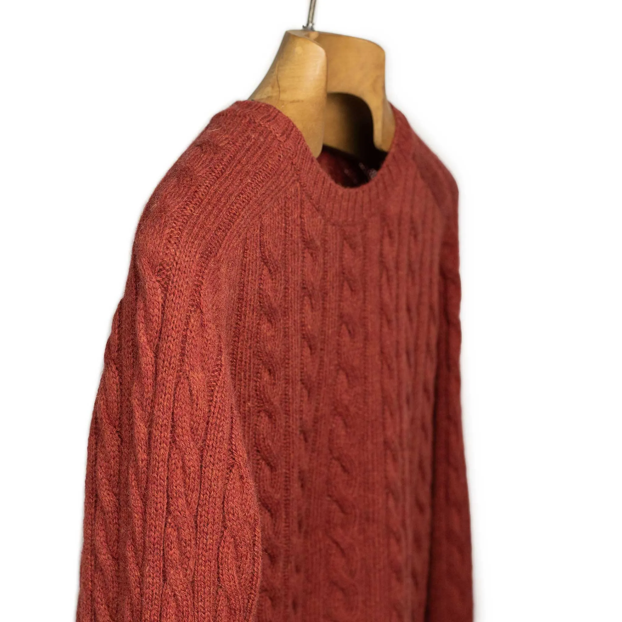 Cable crewneck sweater in brick red wool